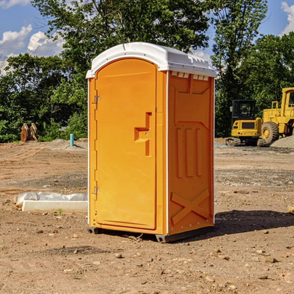 how often are the portable restrooms cleaned and serviced during a rental period in Alton